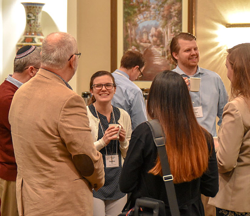 OED researchers networking at conference
